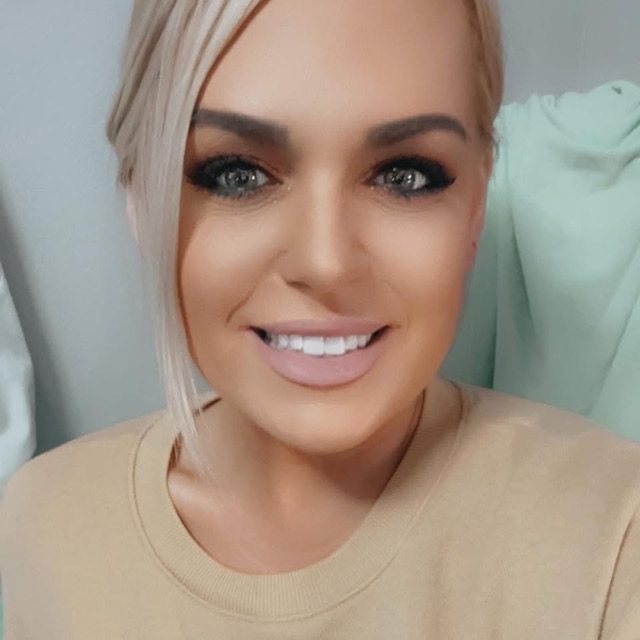 Lindsey of Beyond Blonde Hair Studio with platinum blonde hair